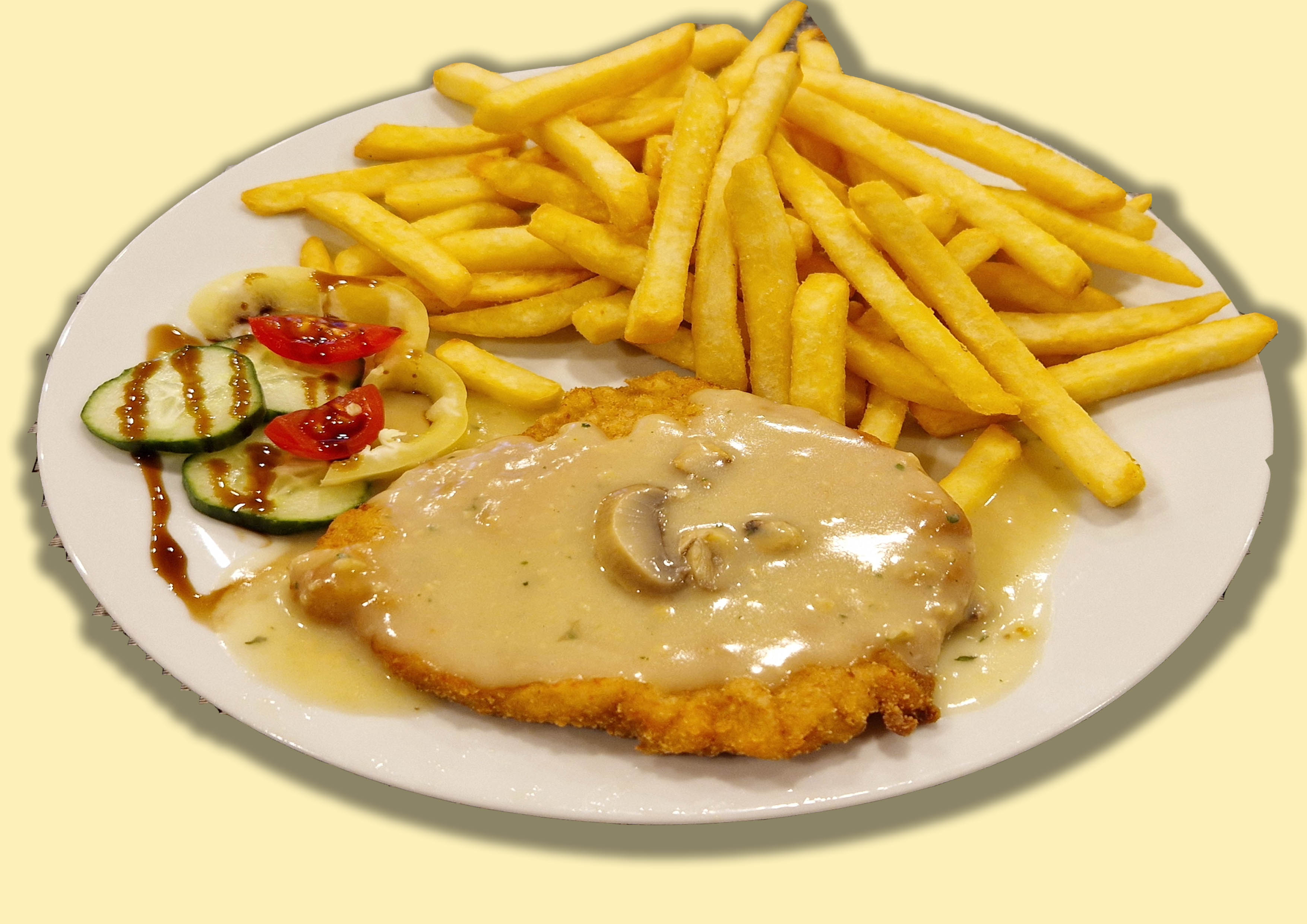 Rántott Jércemell Gombamártással, hasábburgonyával (A,C,G) - Gebratene junge Hähnchenbrust mit Pilzsauce und Pommes frites - Fried JércemFried young chicken breast with mushroom sauce and French friesell with